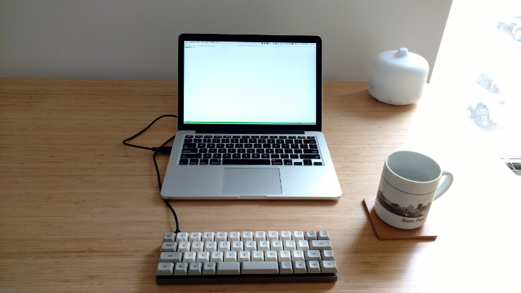 Vortex Core on a desk with a laptop
